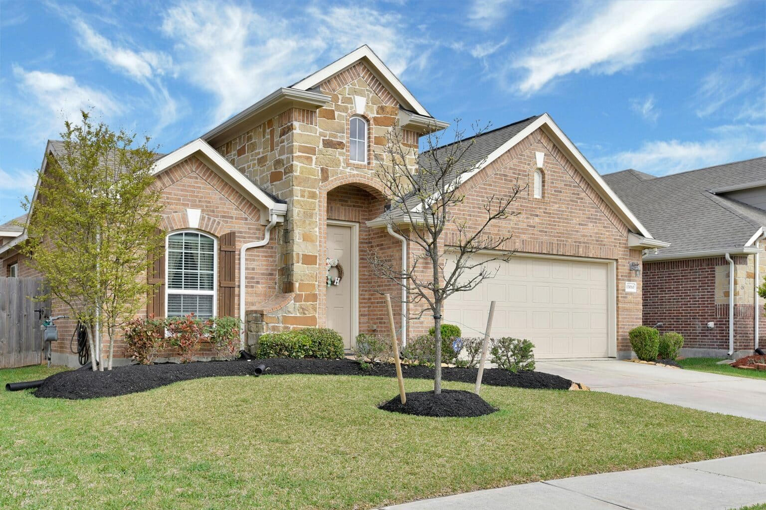 House with stone on the exterior. Cash offer for homes in Garland, TX. We buy houses in Lewisville, TX