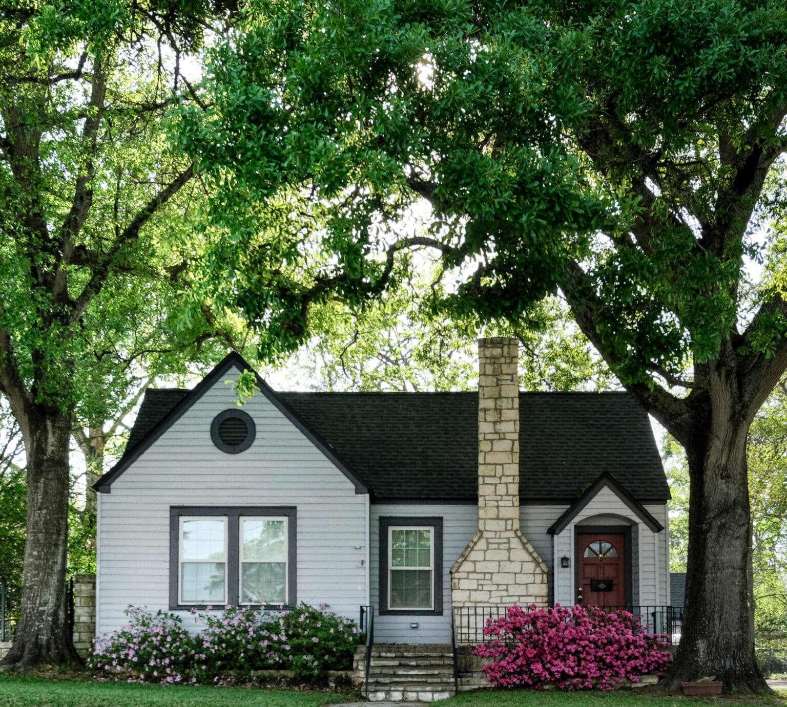 House surrounded by trees. Sell your house fast in Coppell, TX. Sell your house fast for cash in Roanoke, TX.